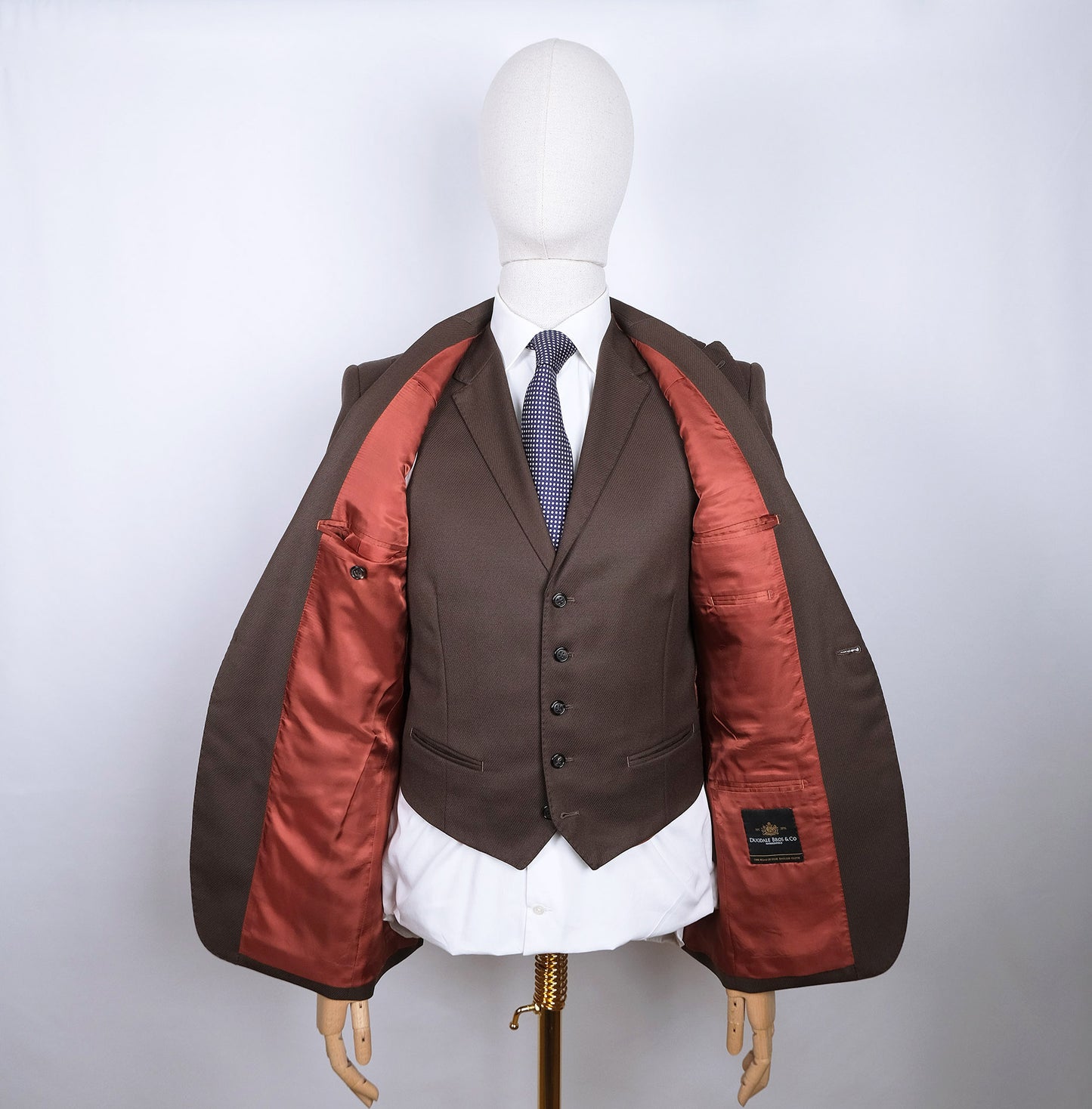 Caine Clothiers, ruskea puku, koko 48, mittatilauspuku